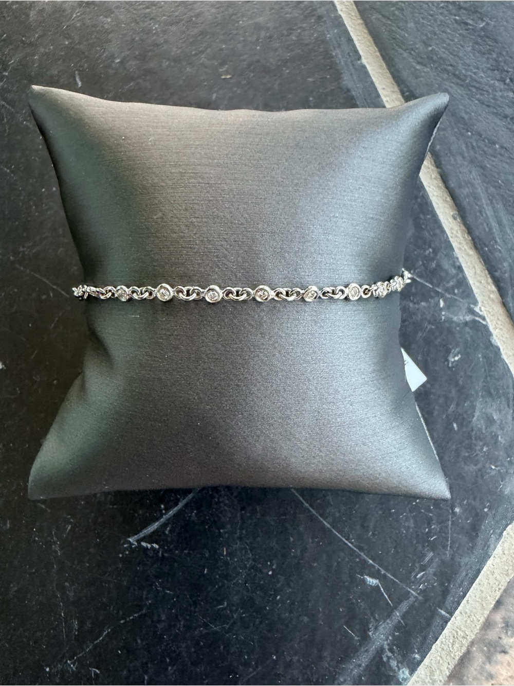 18kt. White Gold Tennis Bracelet with Diamonds bezel set 7” long